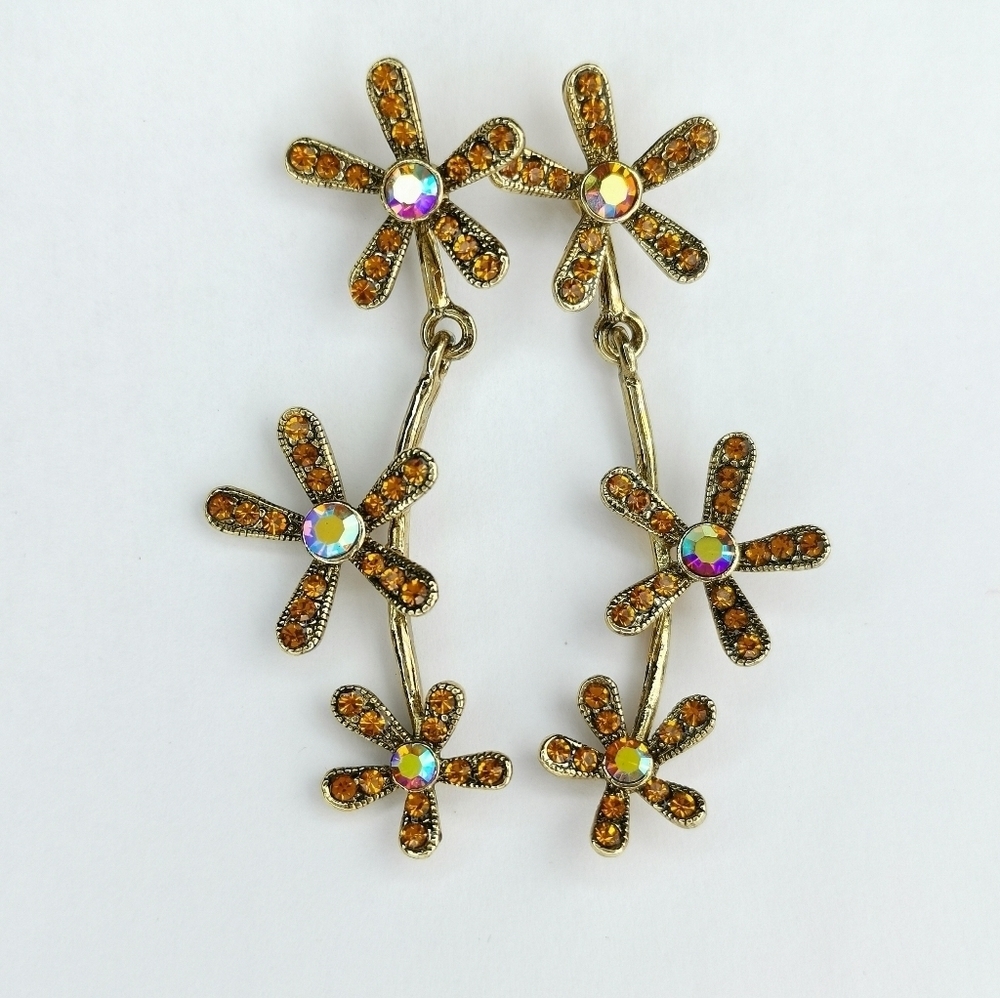 NWT Swarovski gold daisy flower earrings